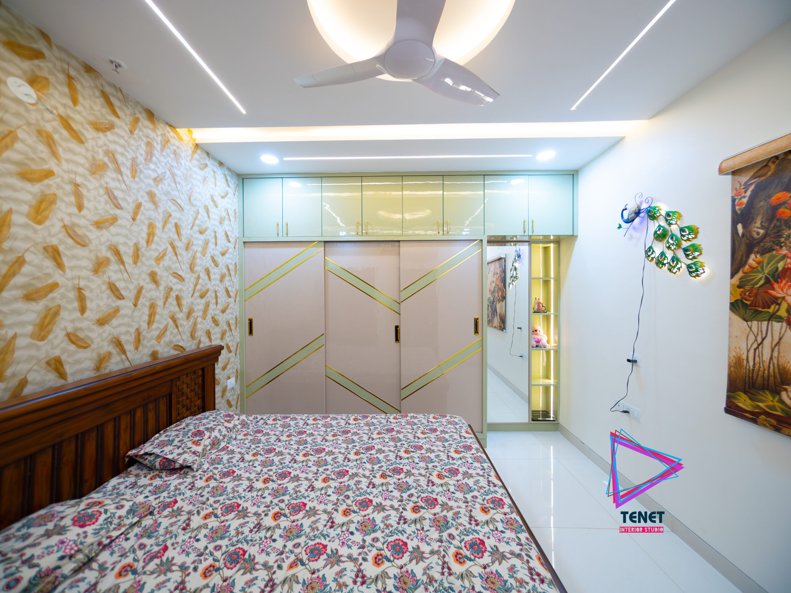 Modern bedroom interior design with cozy bedding, warm lighting, and stylish decor by interior designers in Hyderabad, creating a relaxing and comfortable living space.