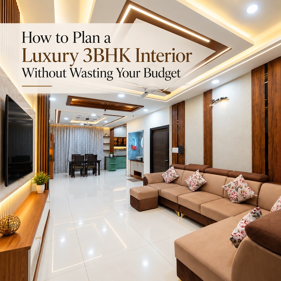 Luxury 3BHK living room design featuring a plush sectional sofa, false ceiling, and wooden TV unit by expert interior designers in Hyderabad.